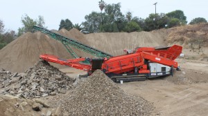 Chandler’s Sand & Gravel relies on a QE440 scalping screen from Sandvik to handle mixed loads such as concrete-asphalt. So far, Vice President Trevor Wood says the Sandvik unit is “blowing through” the operation’s material.