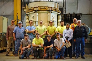 Mellott University's class of 2016, pictured with faculty and administrators in front of a crusher they assembled for their final exam. Photo courtesy of Mellott Co.
