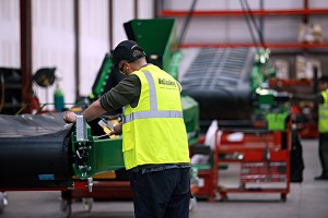 A worker assembles a McCloskey wash plant. Photo courtesy of McCloskey International