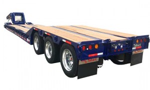 Talbert Manufacturing’s 55CC/RP trailer offers a concentrated load rating of 55 tons in 12.5 feet of deck, allowing owners to haul a variety of equipment, including rollers, pavers, excavators and dozers back view. Photo courtesy of Talbert Manufacturing. 
