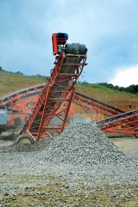 At portable operations, dust is created in several areas – including at and around crushers and at conveyor transfer points. Photo courtesy of Rockster Recycler