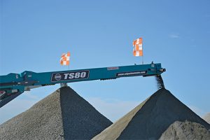 A tracked TS80 stacking conveyor from Edge Innovate is among the equipment essential to the job at Cleveland. Photo by Kevin Yanik