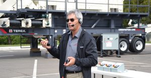 Ed Sauser demonstrates Terex MPS's CCM control system, which can be operated via a simple remote control. P