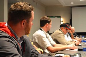 Attendees split up into three teams that had to solve issues from different scenarios. Photo by Allison Barwacz