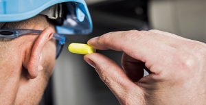 If workers experience standard threshold shifts, employers are required to fit or refit the workers with hearing protectors, train them in the use of the hearing protectors, and require workers to use them. Photo: iStock.com/welcomia