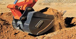 Pairing a trenching bucket with a crawler excavator in trenching or deep-digging applications should result in increased efficiency. Photo courtesy of Two Rivers Marketing.