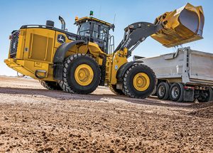 John Deere's new line of wheel loaders include cabs that offer premium radio, a backup camera, automatic temperature control and power-adjusted exterior mirrors. Photo courtesy of John Deere