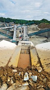 The view down the portable spread from atop the CRJ3255 jaw crusher. Photo by Kevin Yanik