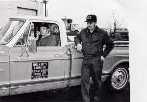 Roy Schultz, left, and Myrl Unzelman launched the business more than five decades ago with a $500 dump truck, a rake, a shovel and their determination. Photo courtesy of Myrl & Roy’s Paving