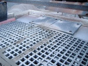 Rubber media is typically put to use with heavier, coarser materials. (Photo: McLanahan Corp.)