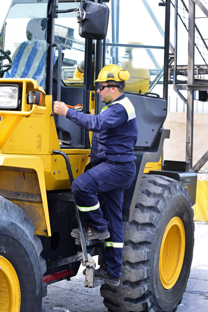 Maintaining three points of contact when entering or exiting a construction vehicle is one way to help prevent slips and falls. Photo: sykono/iStock / Getty Images Plus/Getty Images